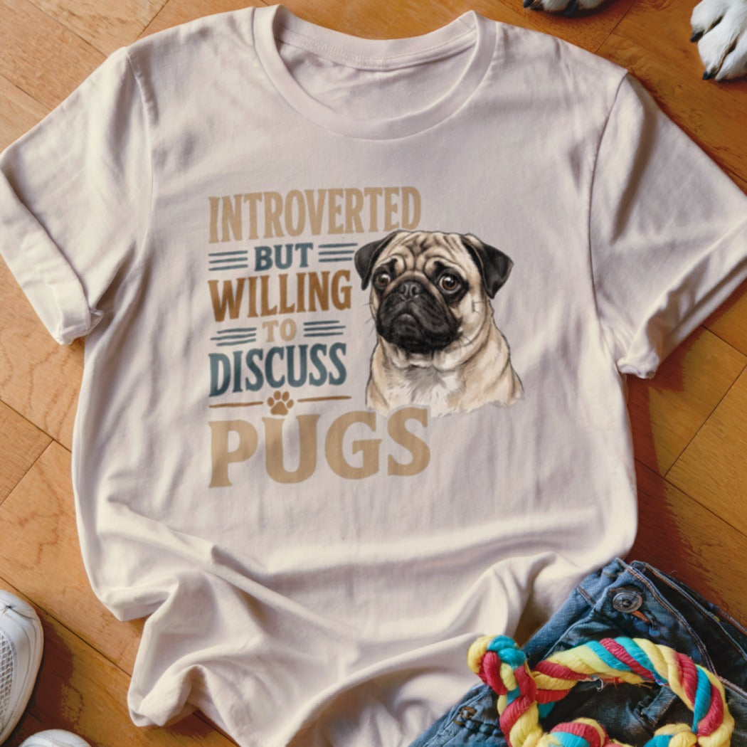Cream t-shirt with pug illustration and text: "Introverted but willing to discuss pugs".
