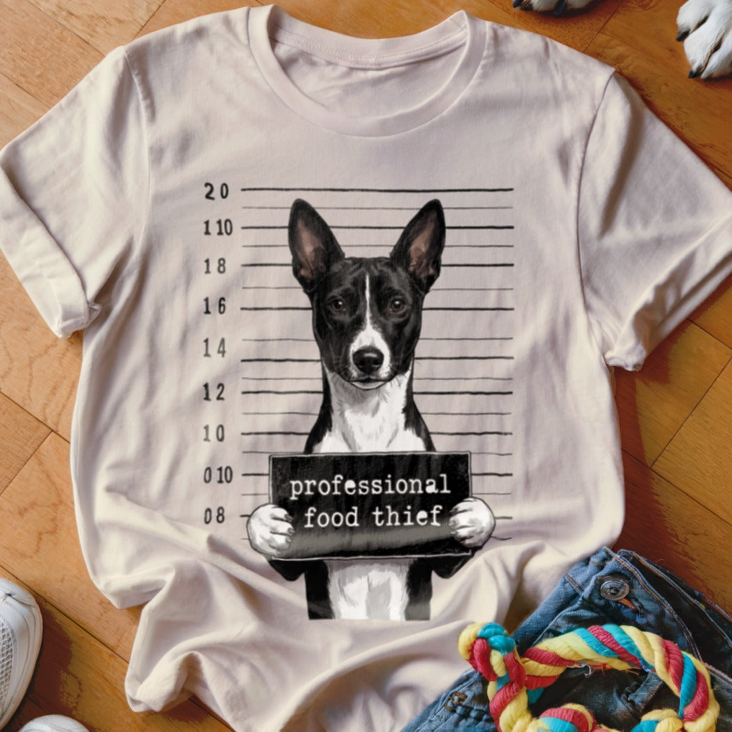 T-shirt featuring a black and white dog mugshot with "professional food thief" text.