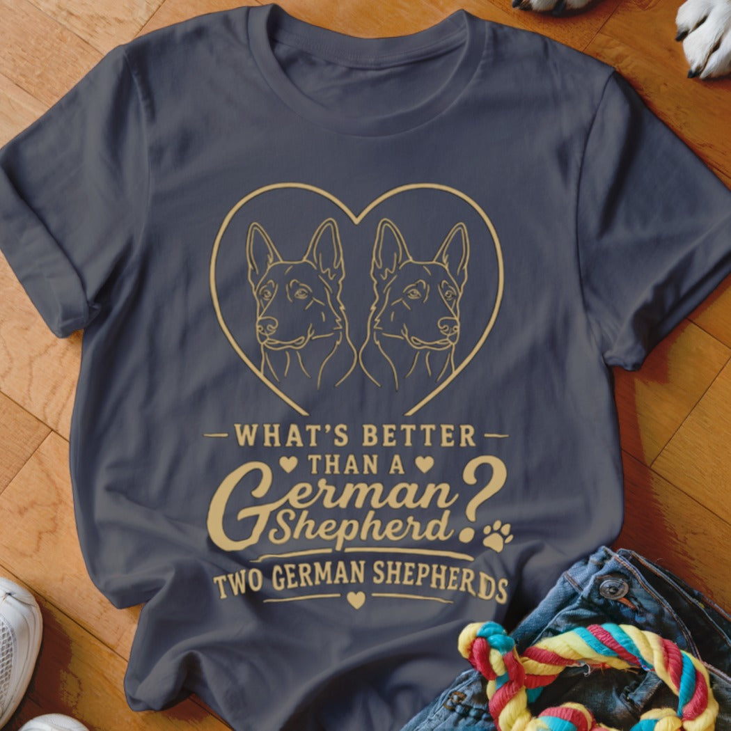 Dark t-shirt with gold outline of two German Shepherds inside a heart and text about them.