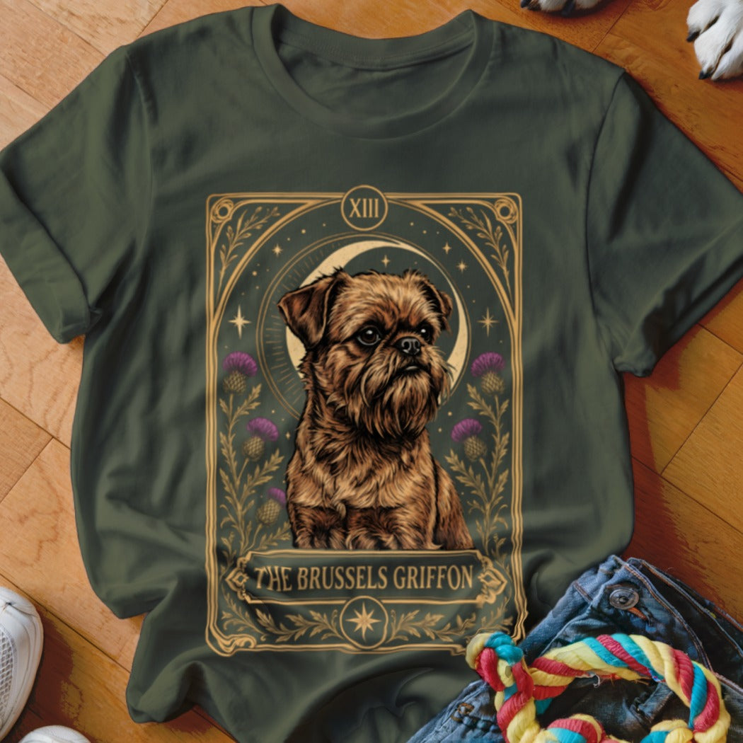 Dark green t-shirt featuring a tarot card graphic of a Brussels Griffon surrounded by thistle flowers.