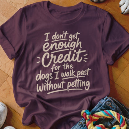 Maroon t-shirt with text "I don't get enough credit for the dogs I walk past without petting."