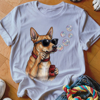 A white t-shirt featuring an illustration of a brown dog wearing sunglasses and blowing bubbles.