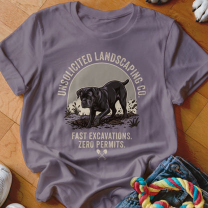 T-shirt with black dog and text "UNSOLICITED LANDSCAPING CO."