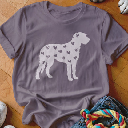 Purple t-shirt with white silhouette of a dog covered in hearts.