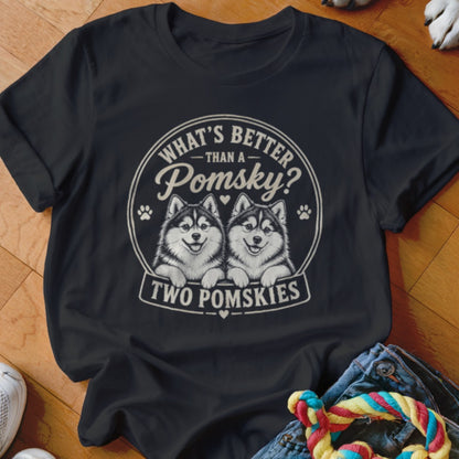 Black t-shirt graphic with two smiling Pomsykis and text "What's Better Than a Pomsky? Two Pomskies".