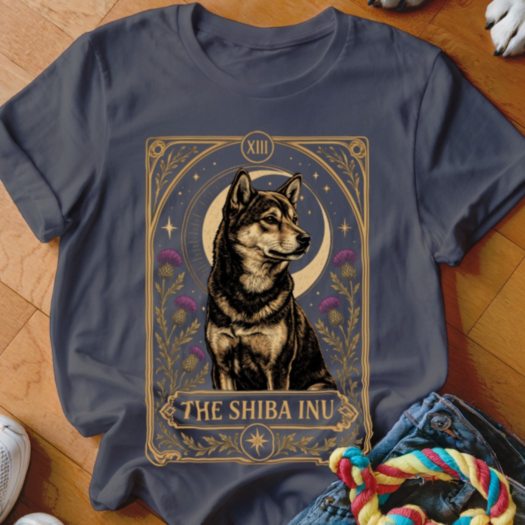 Dark gray t-shirt featuring a tarot-style graphic of a Shiba Inu surrounded by thistles and a crescent moon.