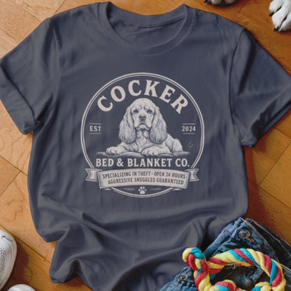Cocker Spaniel illustration on a dark t-shirt with text: Cocker Bed & Blanket Co.