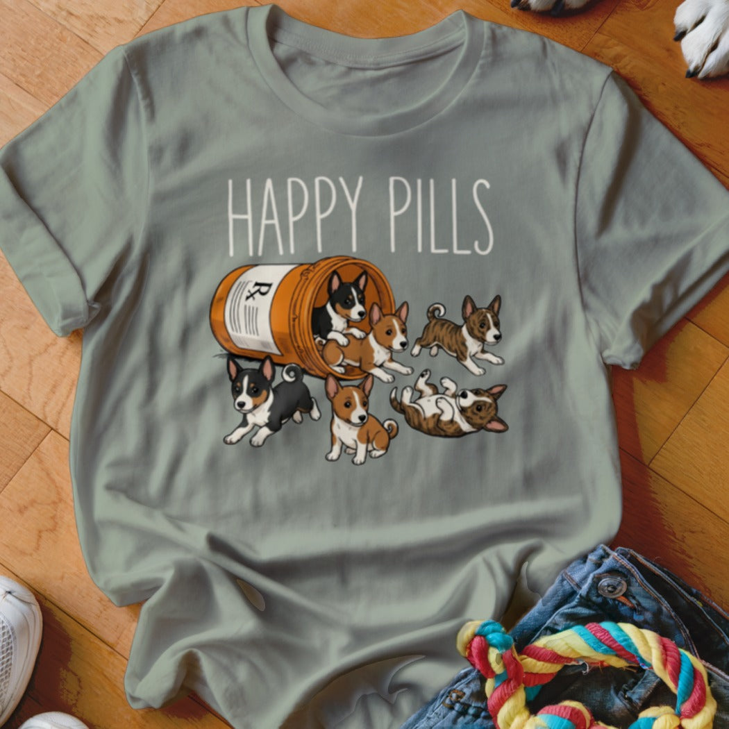 T-shirt with "HAPPY PILLS" text and cartoon puppies spilling from a prescription bottle.