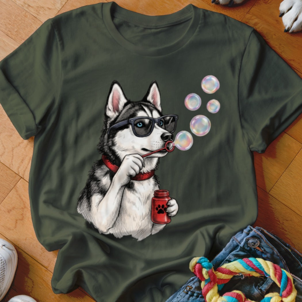 Dark green t-shirt featuring an illustration of a husky wearing glasses and blowing soap bubbles.