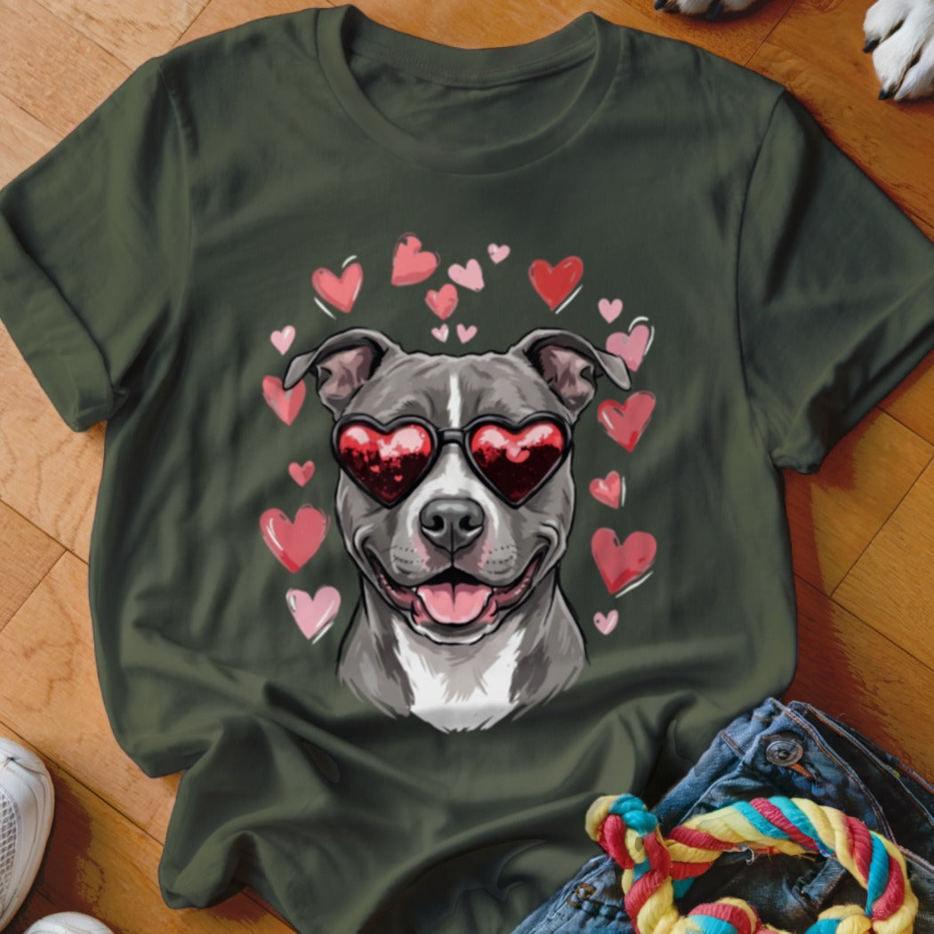 Dark green t-shirt featuring a graphic of a pit bull wearing heart-shaped sunglasses surrounded by floating hearts.