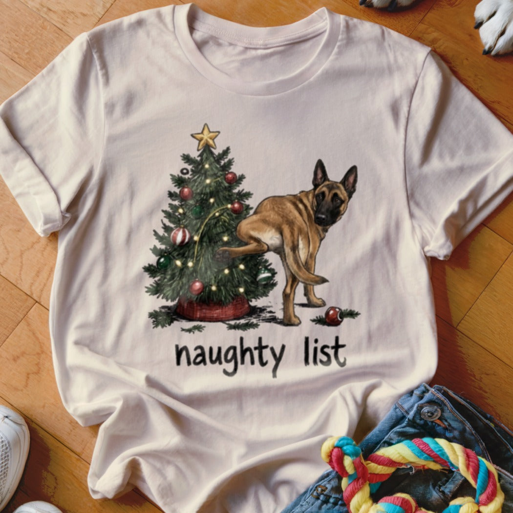 Belgian Malinois near Christmas tree with text "naughty list".