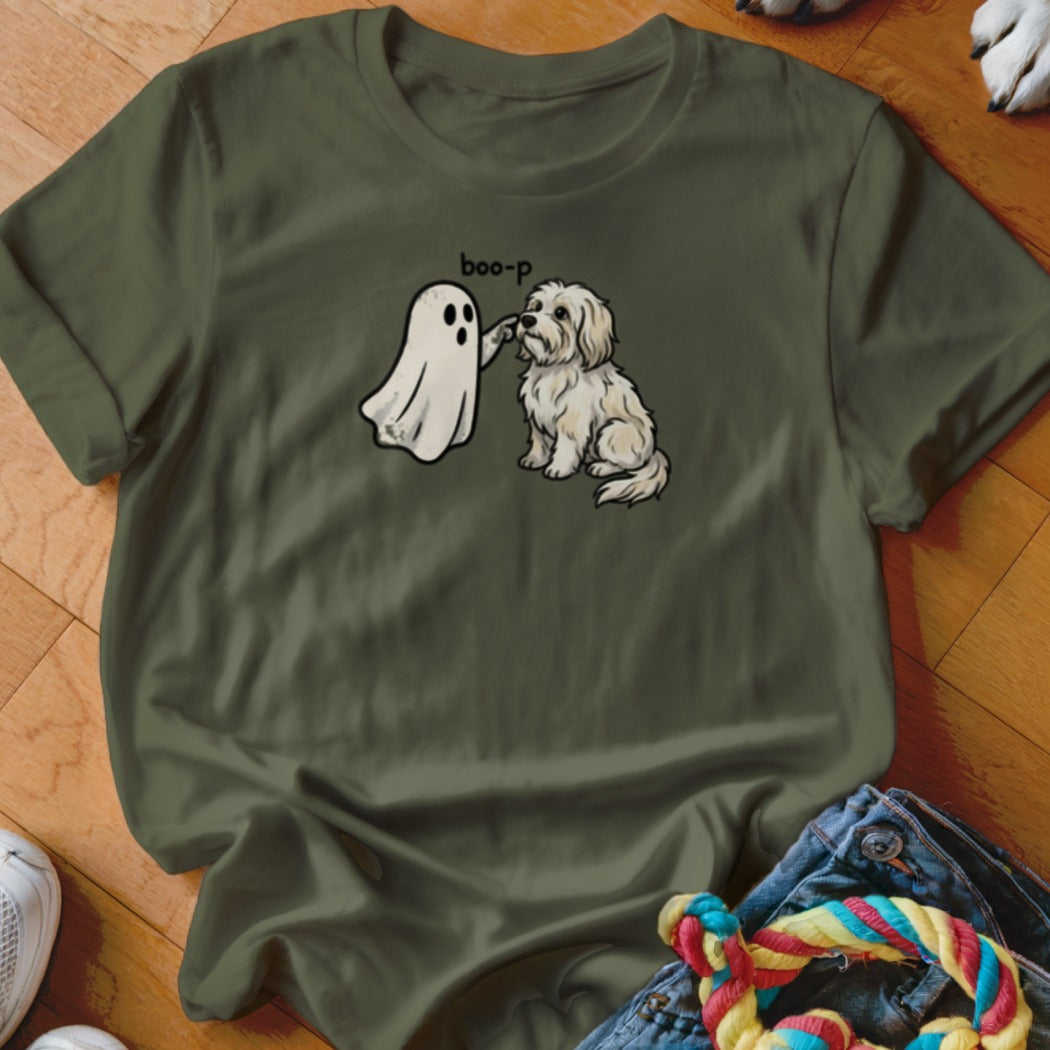 White dog boops a ghost with text "boo-p" on a green t-shirt.