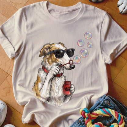 A light pink t-shirt features a graphic of a dog wearing sunglasses and blowing bubbles.