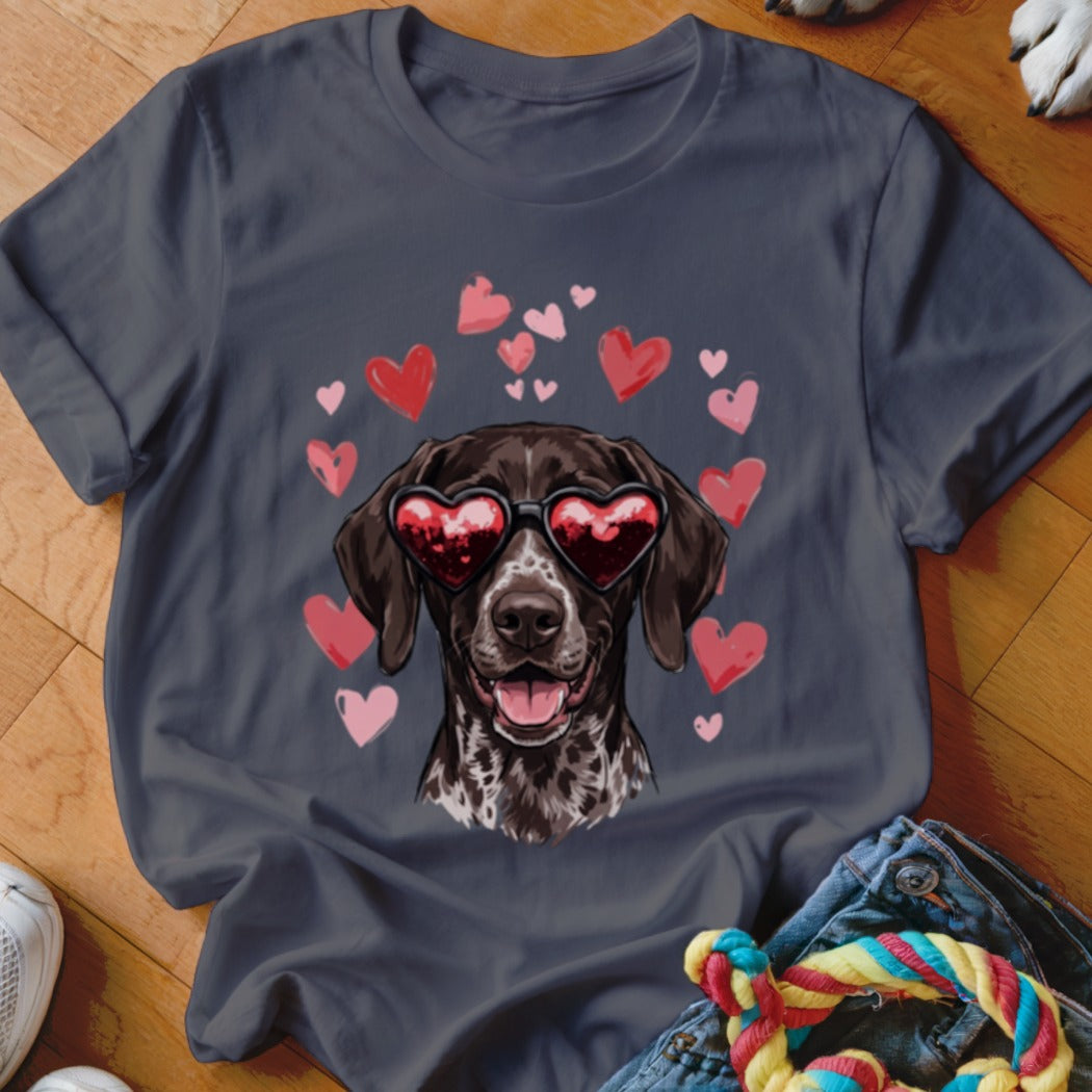 Dark gray t-shirt featuring a graphic of a pointer wearing heart-shaped sunglasses surrounded by pink and red hearts.