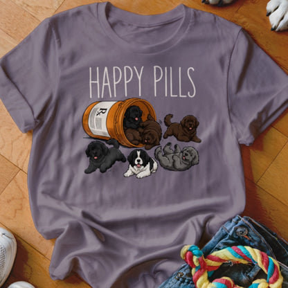 T-shirt with "HAPPY PILLS" text and cartoon puppies spilling from a pill bottle.
