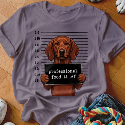 T-shirt graphic of a brown dog mugshot with "professional food thief" sign.