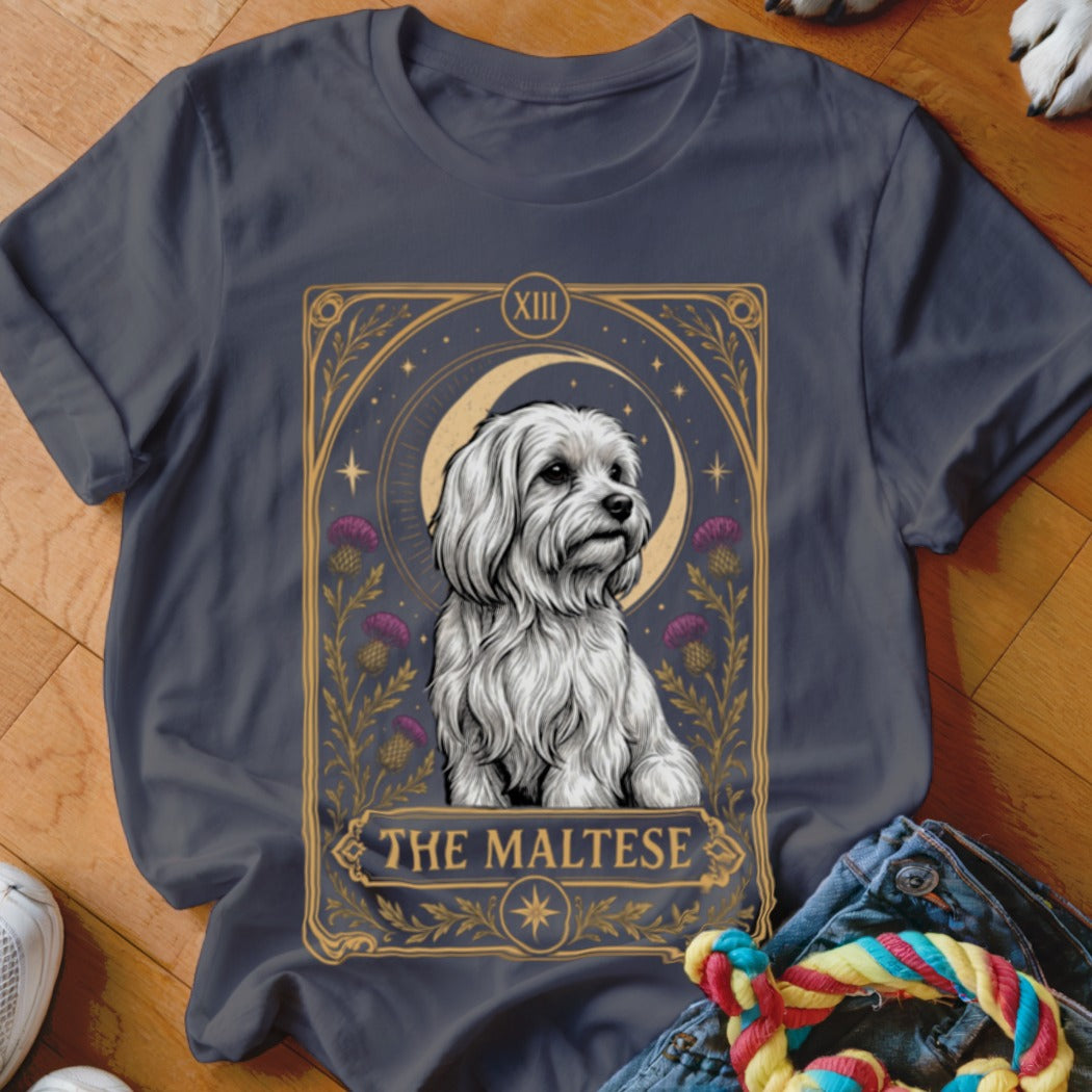 Dark gray t-shirt featuring a tarot card graphic with a white Maltese dog and purple thistles.