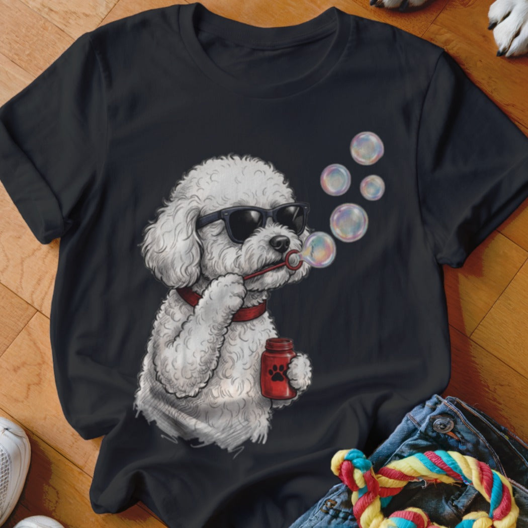 A black t-shirt features a graphic of a white poodle wearing sunglasses and blowing bubbles.