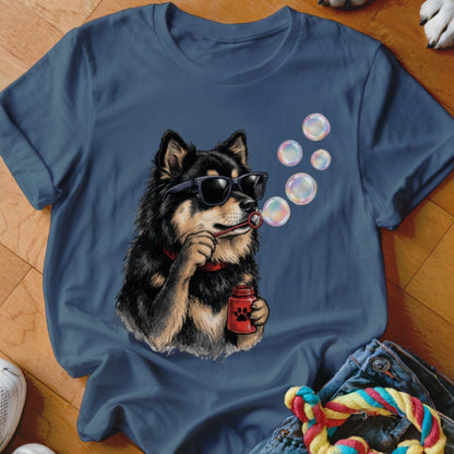 Blue crewneck t-shirt featuring a graphic of a black dog wearing sunglasses and blowing soap bubbles.