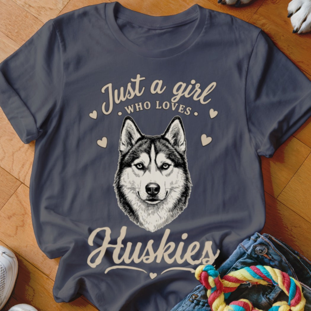 Charcoal gray crewneck t-shirt featuring a husky graphic and the text Just a girl who loves Huskies.