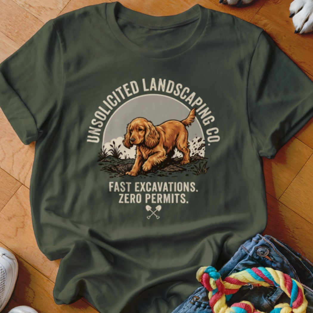 T-shirt graphic with a dog digging and text "Unsolicited Landscaping Co."