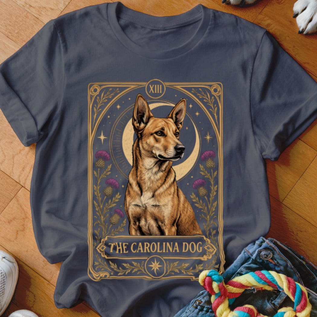 A dark gray t-shirt featuring a tarot card graphic of a Carolina Dog.
