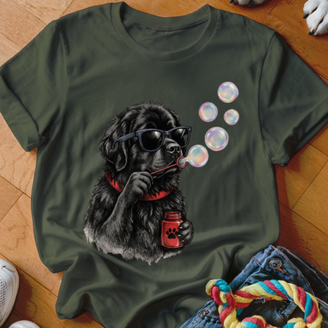 Olive green crewneck t-shirt featuring a graphic of a black dog wearing sunglasses and blowing bubbles.