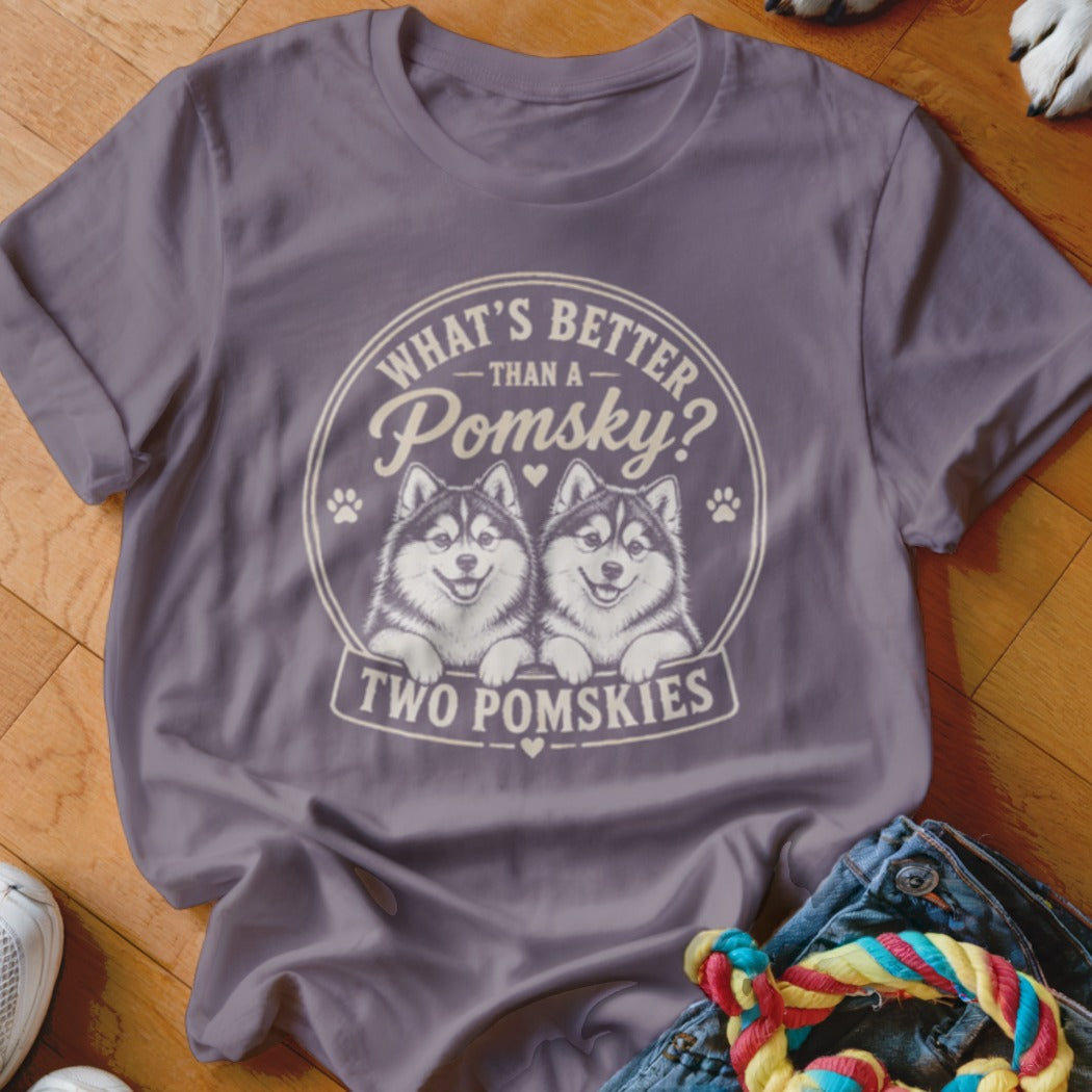 Shirt graphic with two smiling Pomsks and text "What's better than a Pomsky? Two Pomskies."