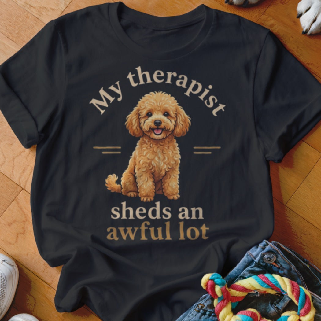 Black t-shirt with text "My therapist sheds an awful lot" and a poodle.