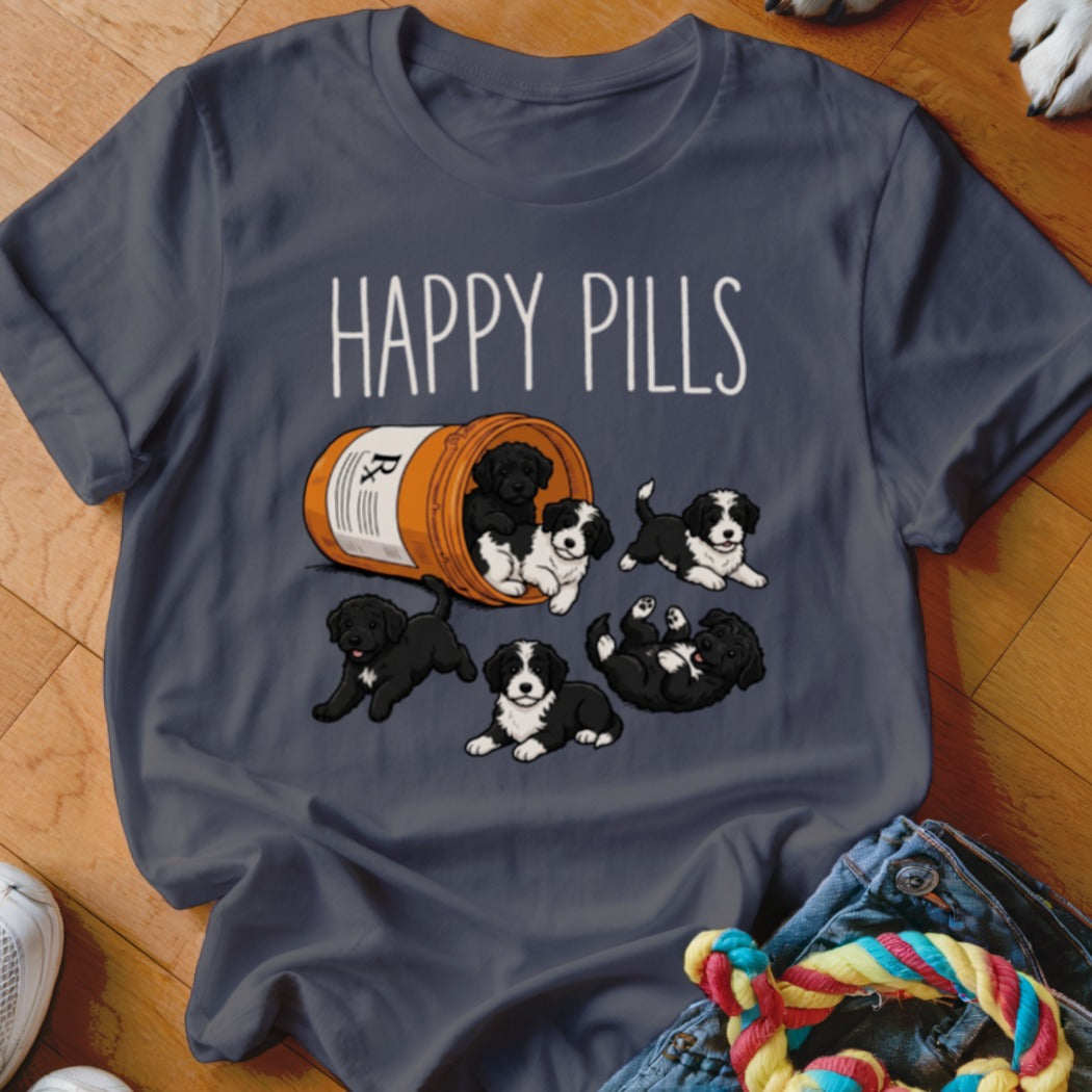 T-shirt graphic with spilled prescription bottle and six puppies with "HAPPY PILLS" text above.