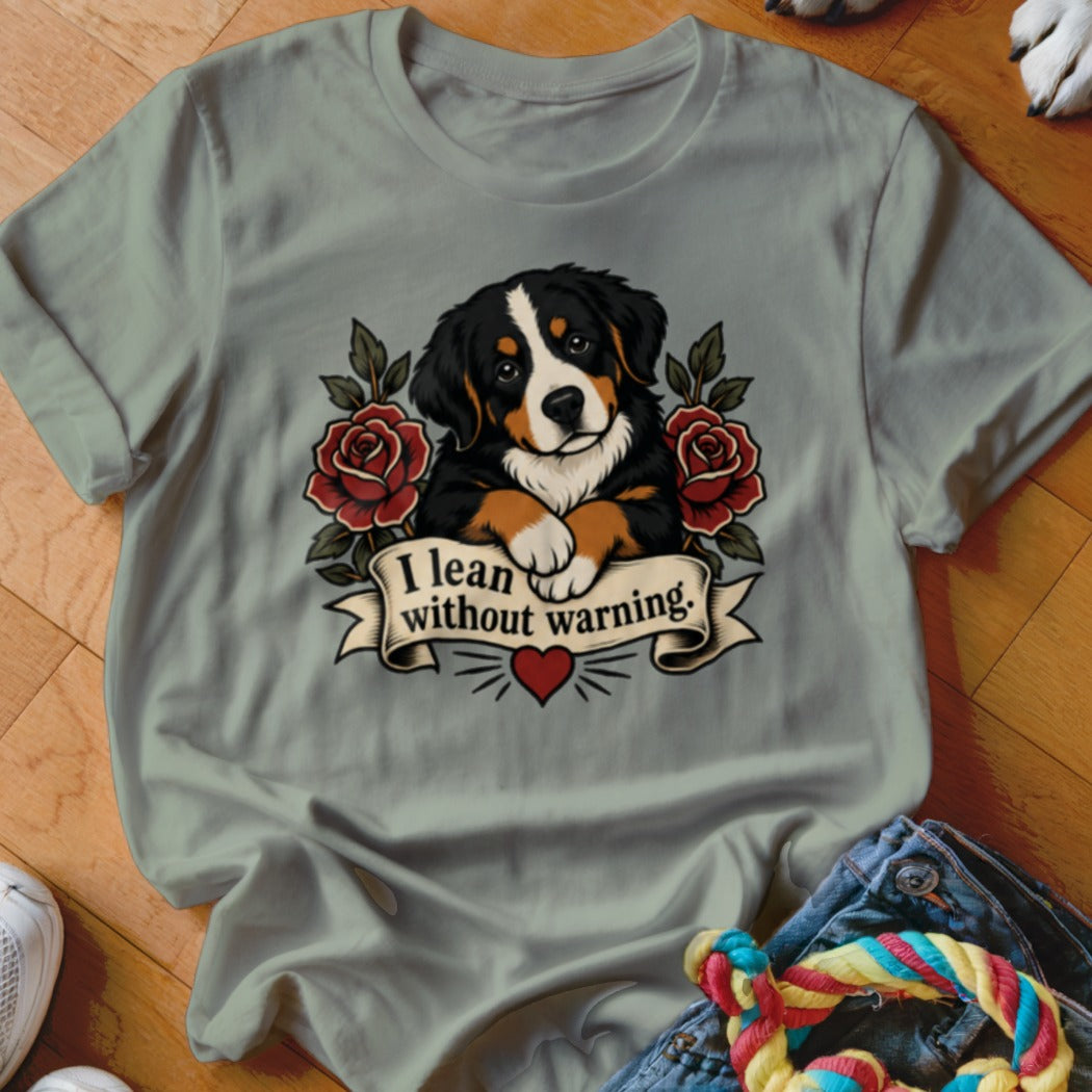 Bernese Mountain Dog with roses and banner reading "I lean without warning."