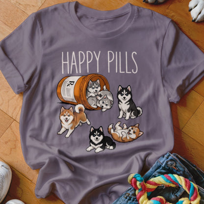 T-shirt with "Happy Pills" text and cartoon husky puppies spilling from a pill bottle.