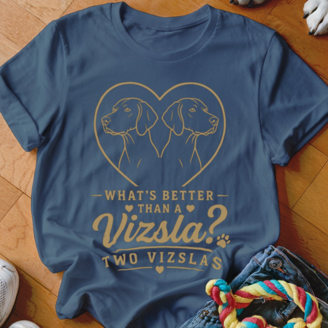 A dark blue t-shirt printed with a gold Vizsla design and text reading "What's better than a Vizsla? Two Vizslas".