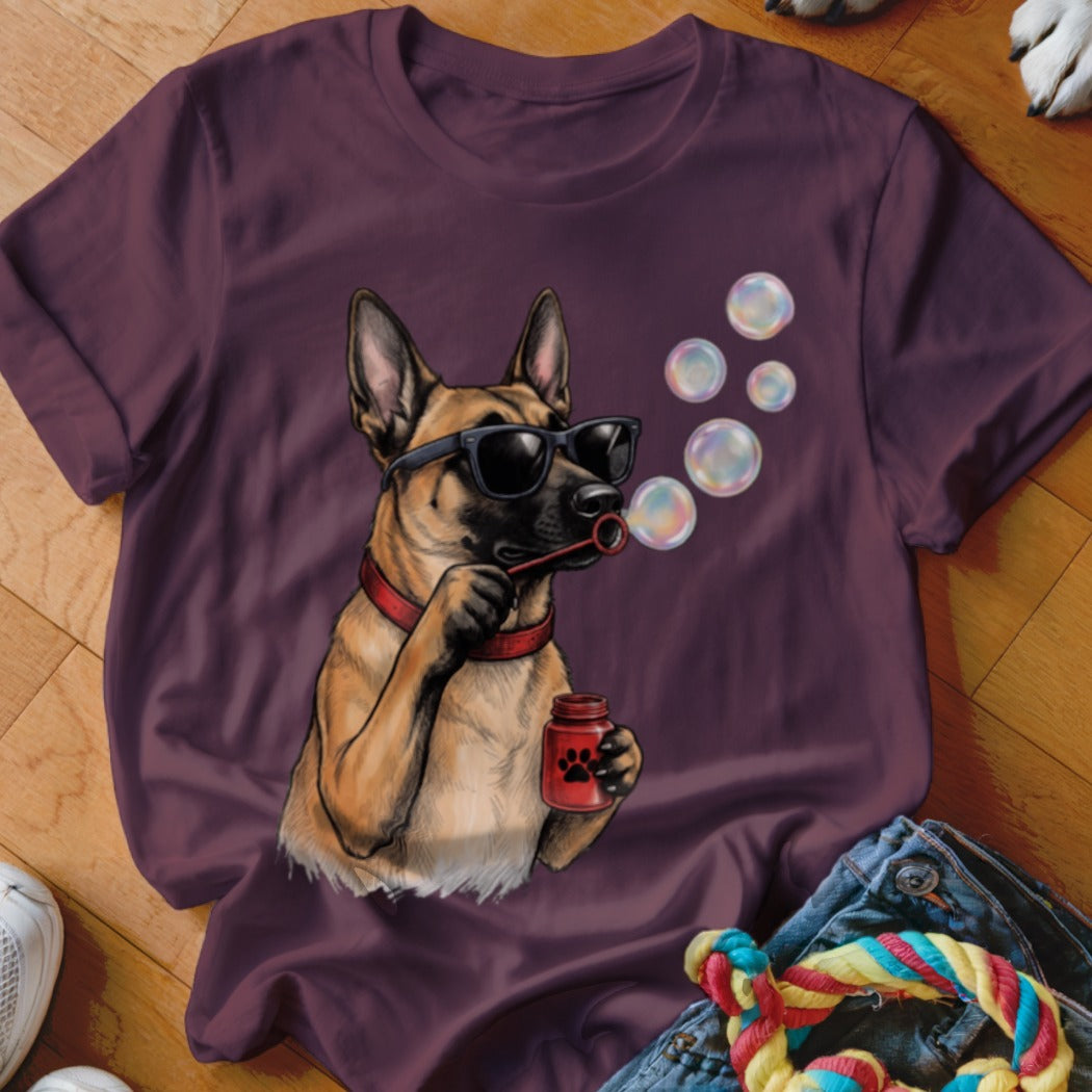 Maroon crewneck t-shirt featuring a graphic of a German Shepherd wearing sunglasses and blowing bubbles.