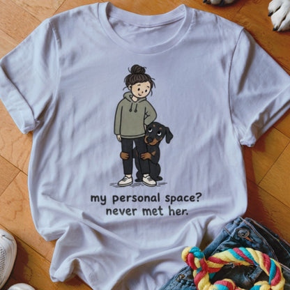 White t-shirt with cartoon of a girl and dog, text "my personal space? never met her."