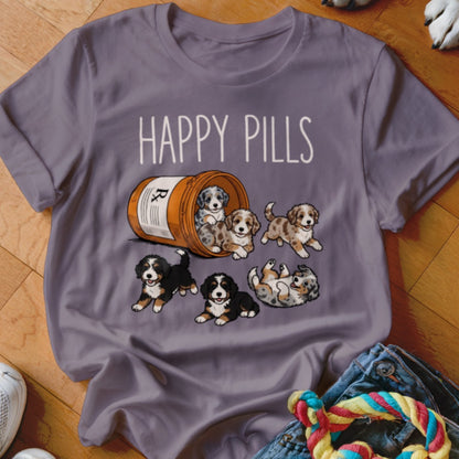 T-shirt with "HAPPY PILLS" text and a prescription bottle filled with puppies.