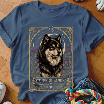 A dark blue t-shirt featuring a tarot card graphic of a Finnish Lapphund.