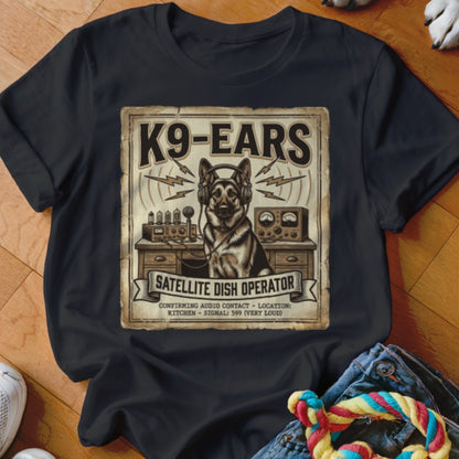 German Shepherd wearing headphones labeled K9-EARS, operating radio equipment.