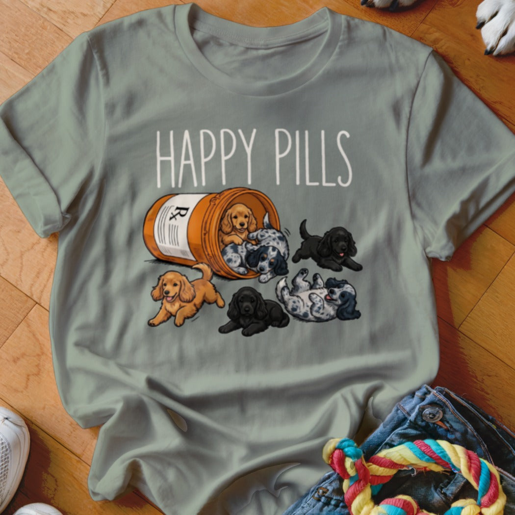 Puppies spill out of a pill bottle with "HAPPY PILLS" text above.