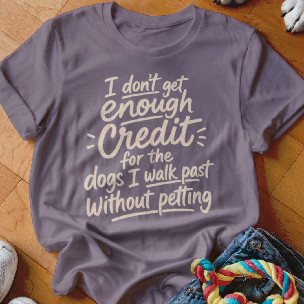Purple t-shirt with text "I don't get enough credit for the dogs I walk past without petting."