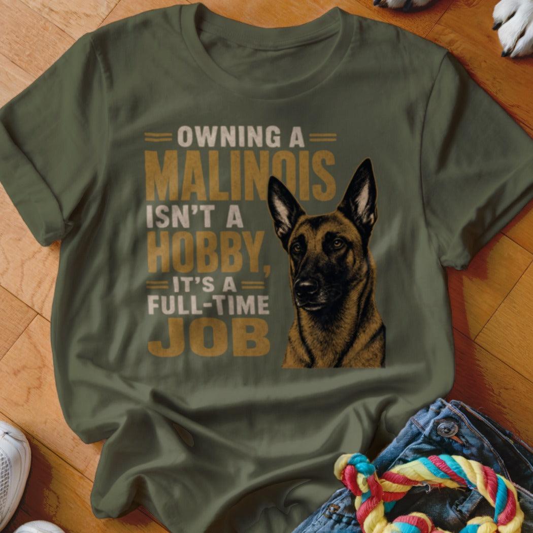 Green t-shirt with "Owning a Malinois Isn't a Hobby, It's a Full-Time Job" and dog graphic.