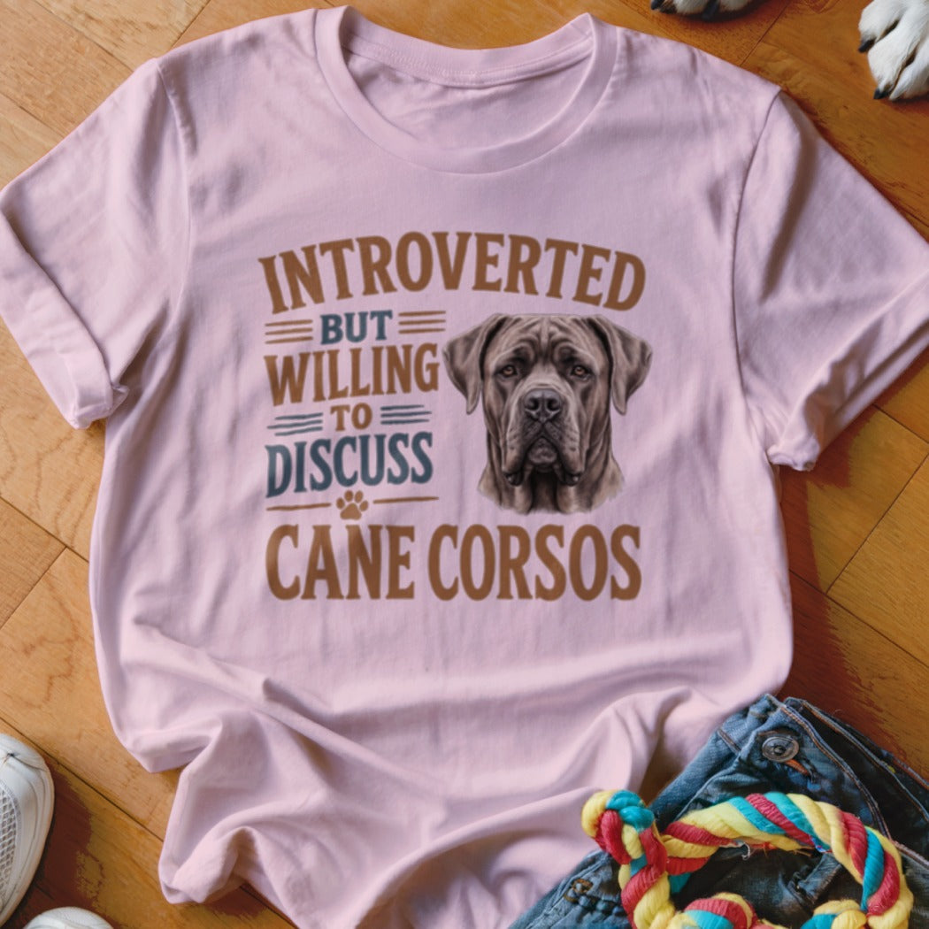 Pink t-shirt with "Introverted but willing to discuss Cane Corsos" text and a dog image.