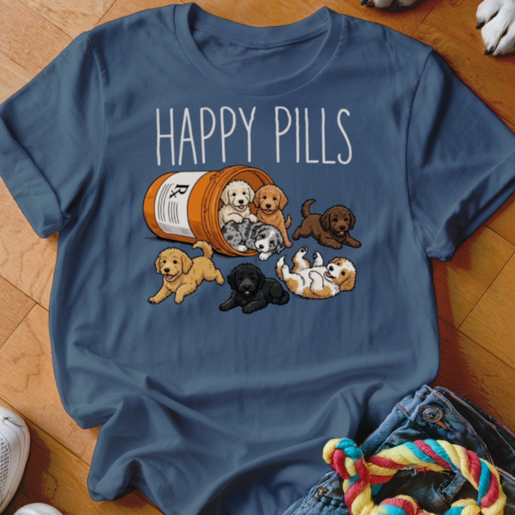 T-shirt with "Happy Pills" text and cartoon puppies spilling from a pill bottle.