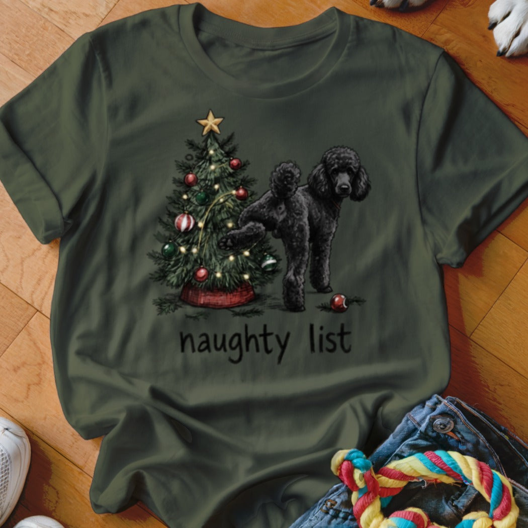 Green t-shirt with a black poodle and Christmas tree graphic that reads "naughty list".