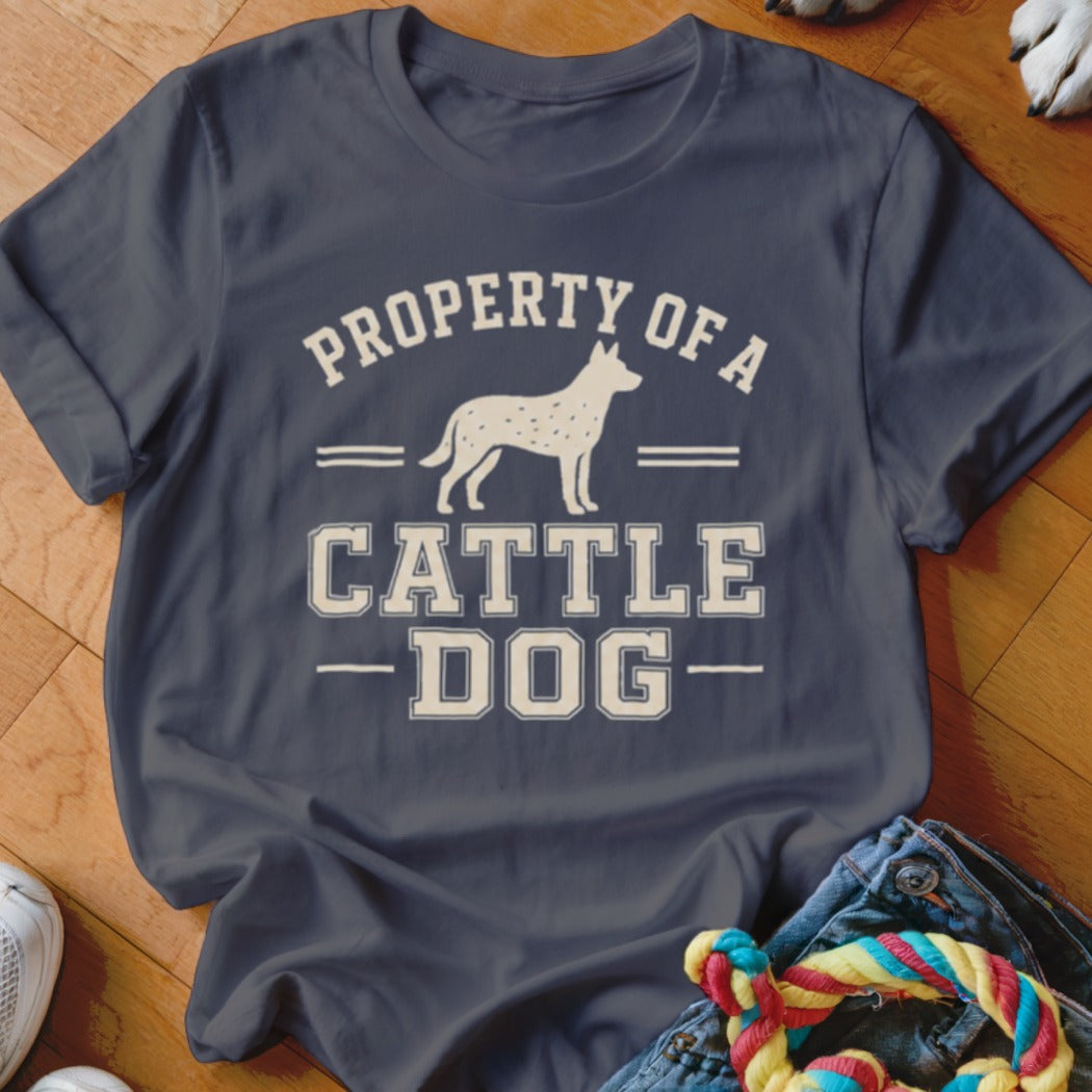 Dark blue t-shirt with "PROPERTY OF A CATTLE DOG" text and dog silhouette.
