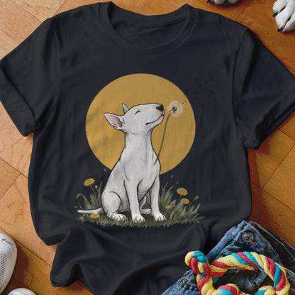 A black t-shirt featuring an illustration of a white bull terrier blowing a dandelion.
