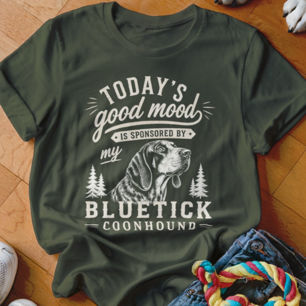 Green t-shirt with "Today's good mood is sponsored by my Bluetick Coonhound" text and dog illustration.