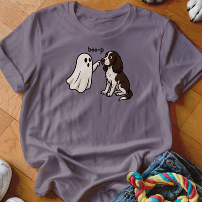 Illustration of a ghost booping a brown and white dog, with "boo-p" text.