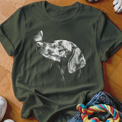 Dark green t-shirt featuring a white sketch graphic of a hound dog looking at a butterfly on its nose.