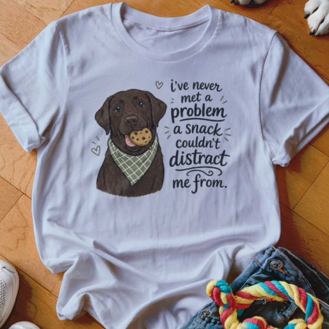 White t-shirt with chocolate lab graphic and text: "i've never met a problem a snack couldn't distract me from."